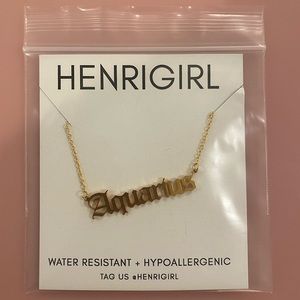 Brand new. Zodiac name plate - Aquarius.